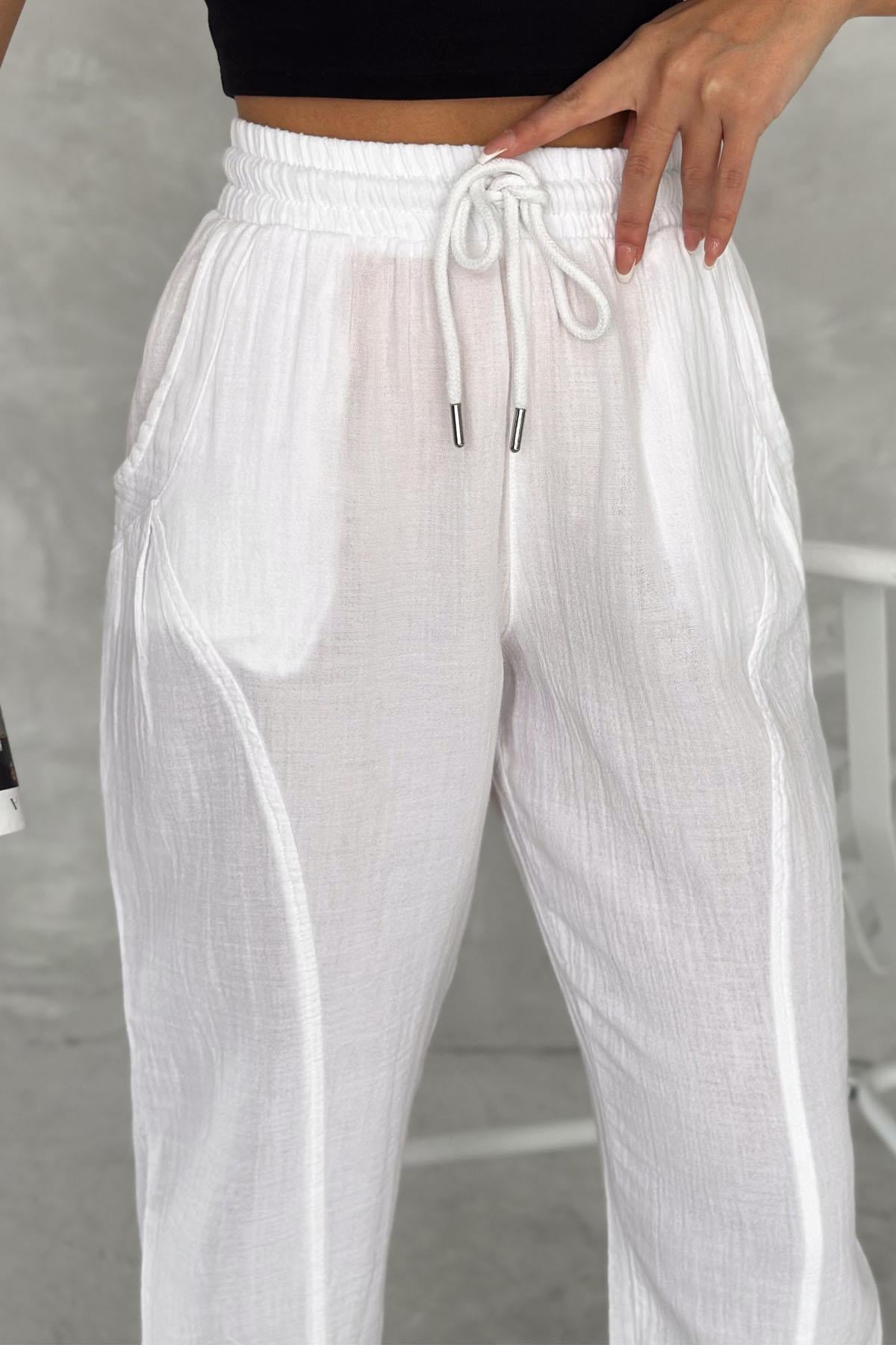 Pamuklu Müslin Kumaş Paça Pensli Balon Pantolonn İstangulbutik.com'da pamuklu müslin kumaştan üretilmiş paça pensli balon pantolonları bulabilirsin. Şıklığı ve rahatlığı bir arada sunan bu pantolonlarla tarzınızı tamamlayın!PantolonİSTANGÜL BUTİK