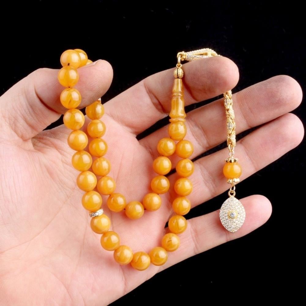 Gümüş Püsküllü Sarı Renk Ateş Kehribar TesbihAteş Kehribar Tesbih