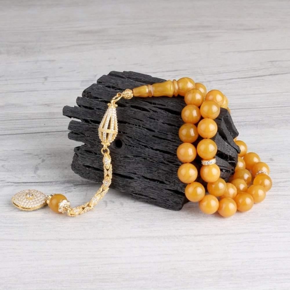 Gümüş Püsküllü Sarı Renk Ateş Kehribar TesbihAteş Kehribar Tesbih