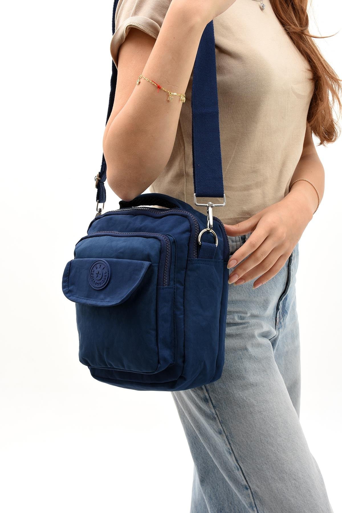 Unisex (Bay-Bayan) Ķüçük Boy Çapraz Askılı El Çantası (Evrak, Telefonluk , Gündelik) Laci (Model: 571-7E)