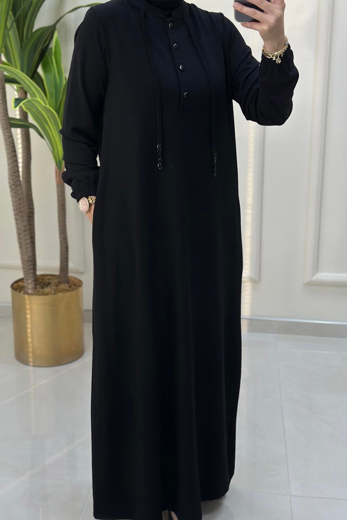 ElbiseÖnü Yarım Düğme İp Detaylı Cepli Fitilli Kadın Örme Elbise Siyah KADO 9473