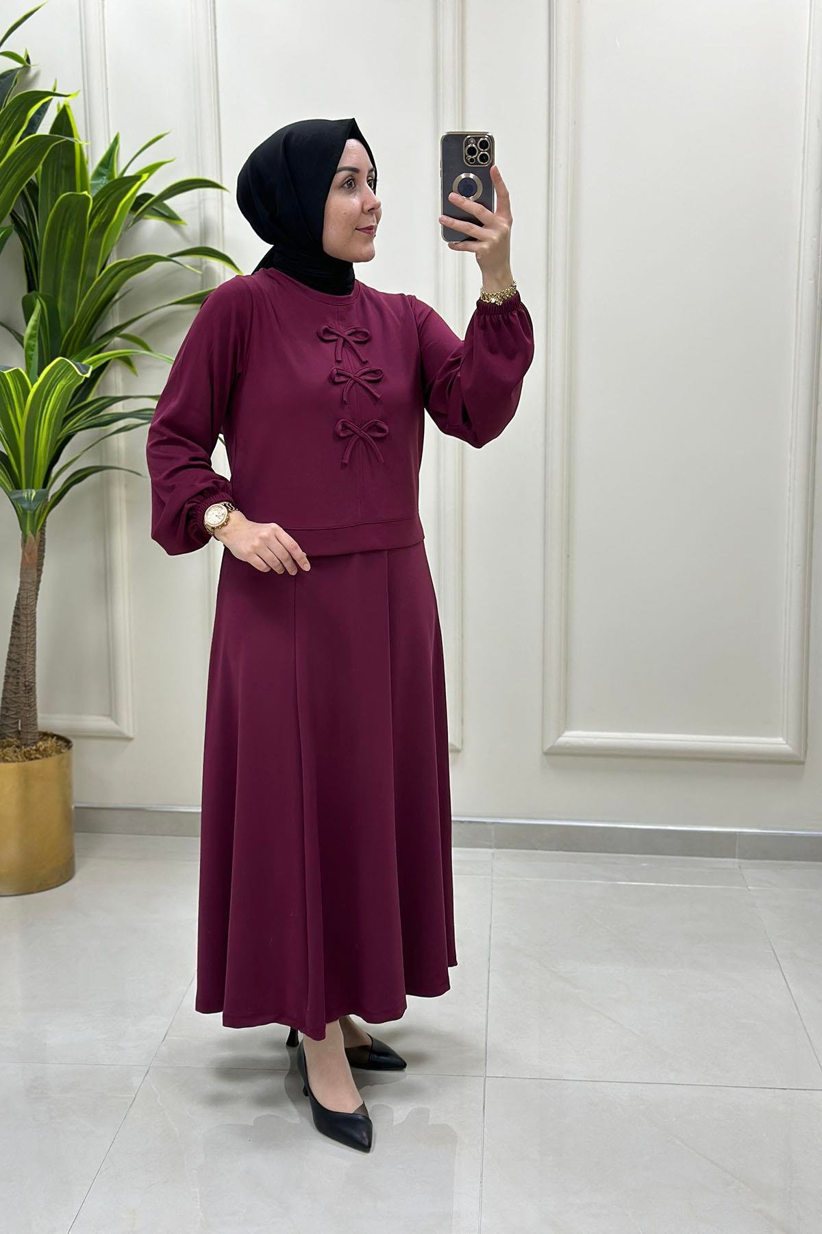 Tesettür Etekli TakımÖnü Fiyonklu Bluz ve Kloş Etek Kadın İkili Takım Açık Bordo KADO 251308