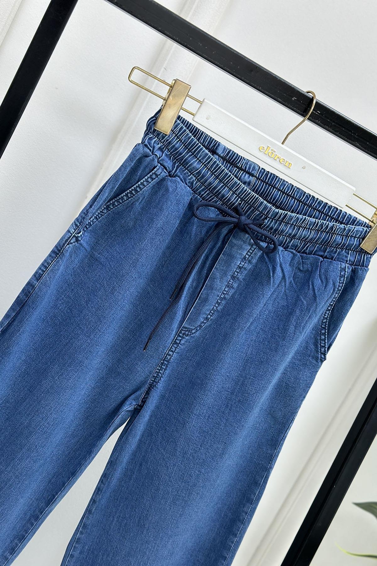 Tesettür PantolonBeli Lastikli Cepli Bol Paça Kadın Kot Pantolon Açık Mavi MP 2657