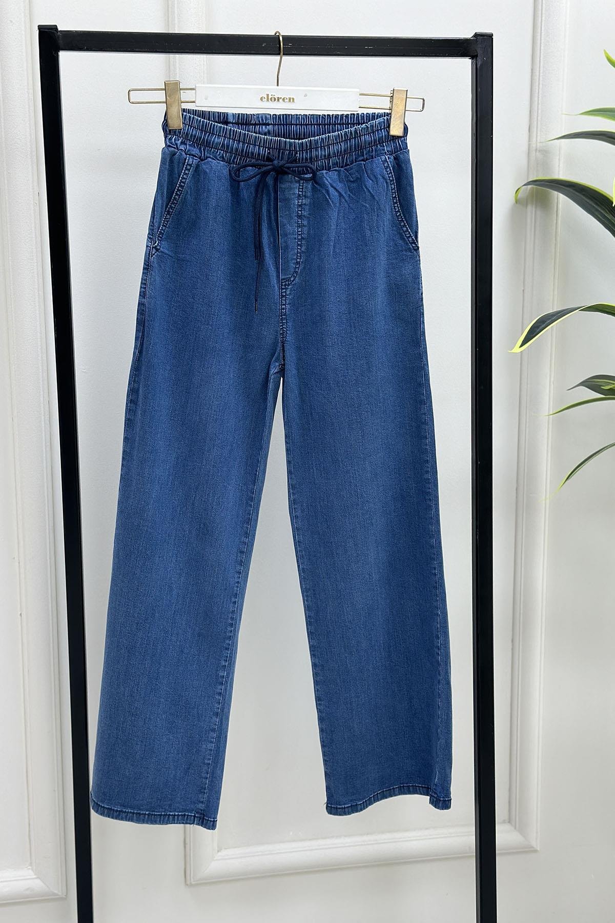 Tesettür PantolonBeli Lastikli Cepli Bol Paça Kadın Kot Pantolon Açık Mavi MP 2657