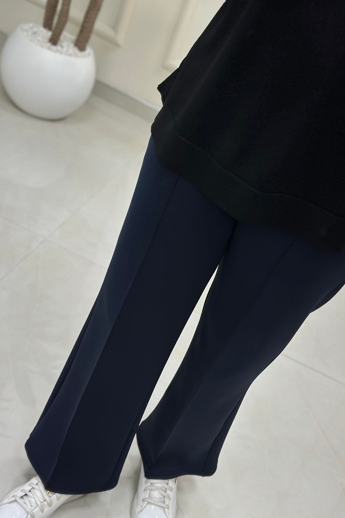 Tesettür PantolonBeli Lastikli Önü Nervürlü Cepli Scuba Pantolon Lacivert AVZ 2601