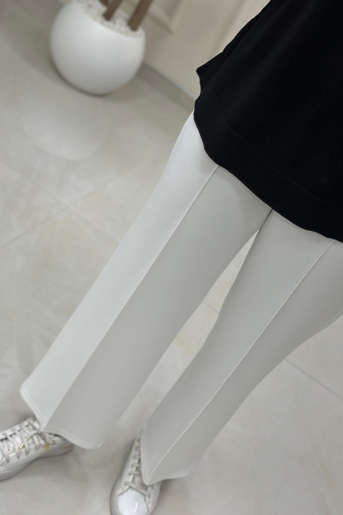 Tesettür PantolonBeli Lastikli Önü Nervürlü Cepli Scuba Pantolon Beyaz AVZ 2601