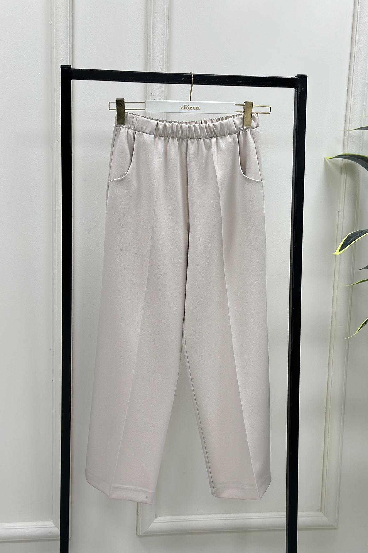 Tesettür PantolonEsmira Beli Lastikli Bol Paça Cepli Kadın Pantolon Bej ESM 1301