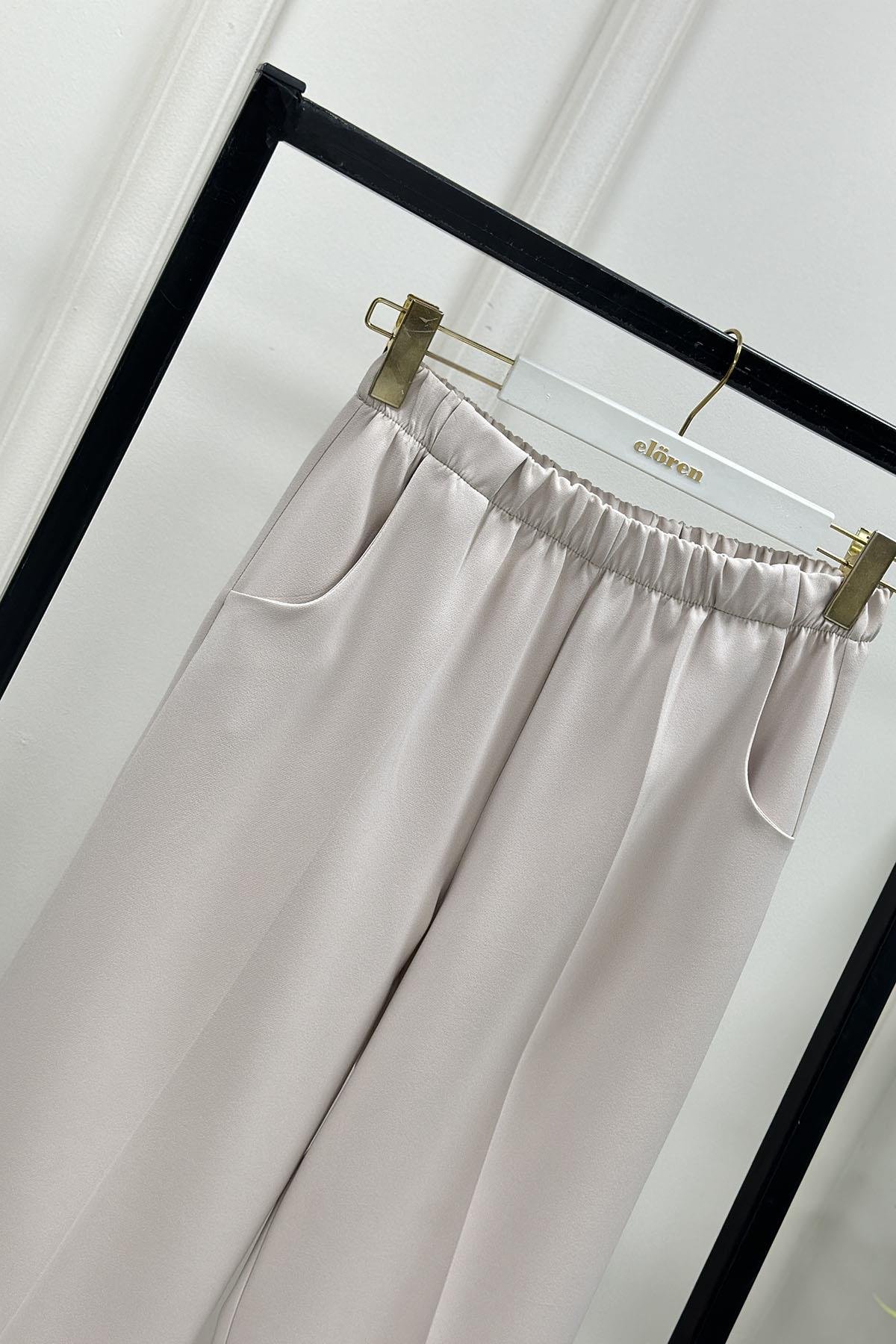 Tesettür PantolonEsmira Beli Lastikli Bol Paça Cepli Kadın Pantolon Bej ESM 1301