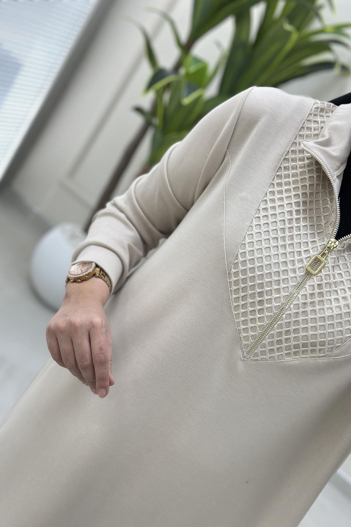 Tesettür Pantolonlu TakımÖnü File ve Fermuar Detaylı Tunik ve Pantolon Kadın İkili Takım Bej KADO 5126