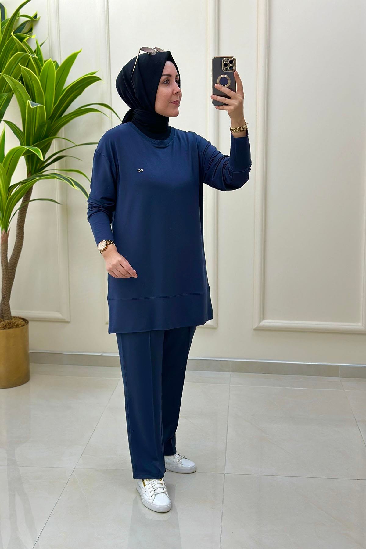 Tesettür Pantolonlu TakımYaka Ribanalı Tunik ve Önü Çimalı Pantolon Kadın İkili Takım Lacivert KADO 257272