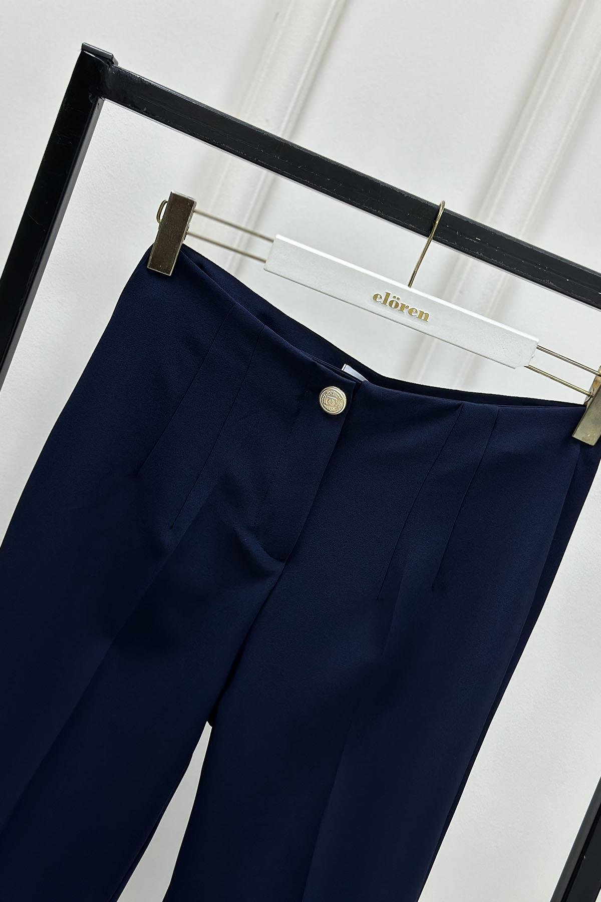 Tesettür PantolonOzan Aydın Paça Düğme Detaylı Kadın Dar Paça Pantolon Lacivert OZN 5023