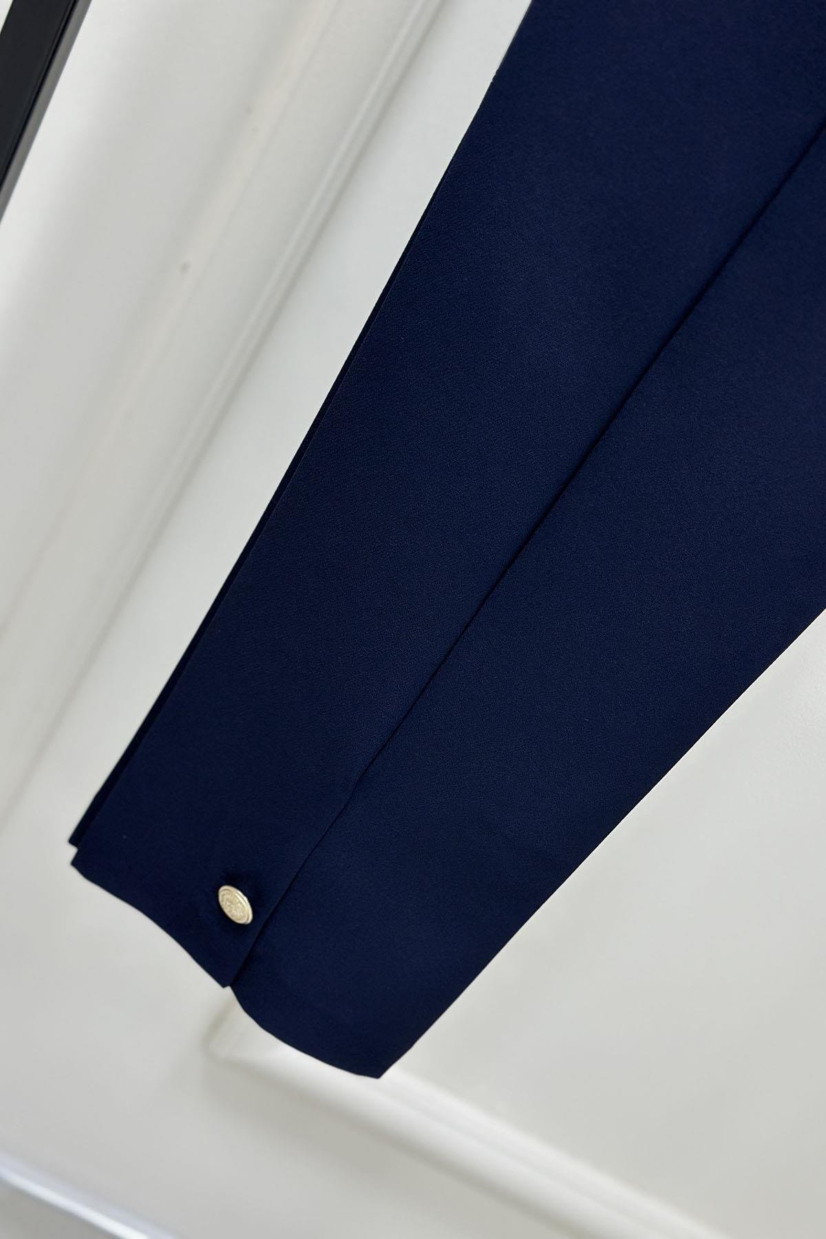 Tesettür PantolonOzan Aydın Paça Düğme Detaylı Kadın Dar Paça Pantolon Lacivert OZN 5023