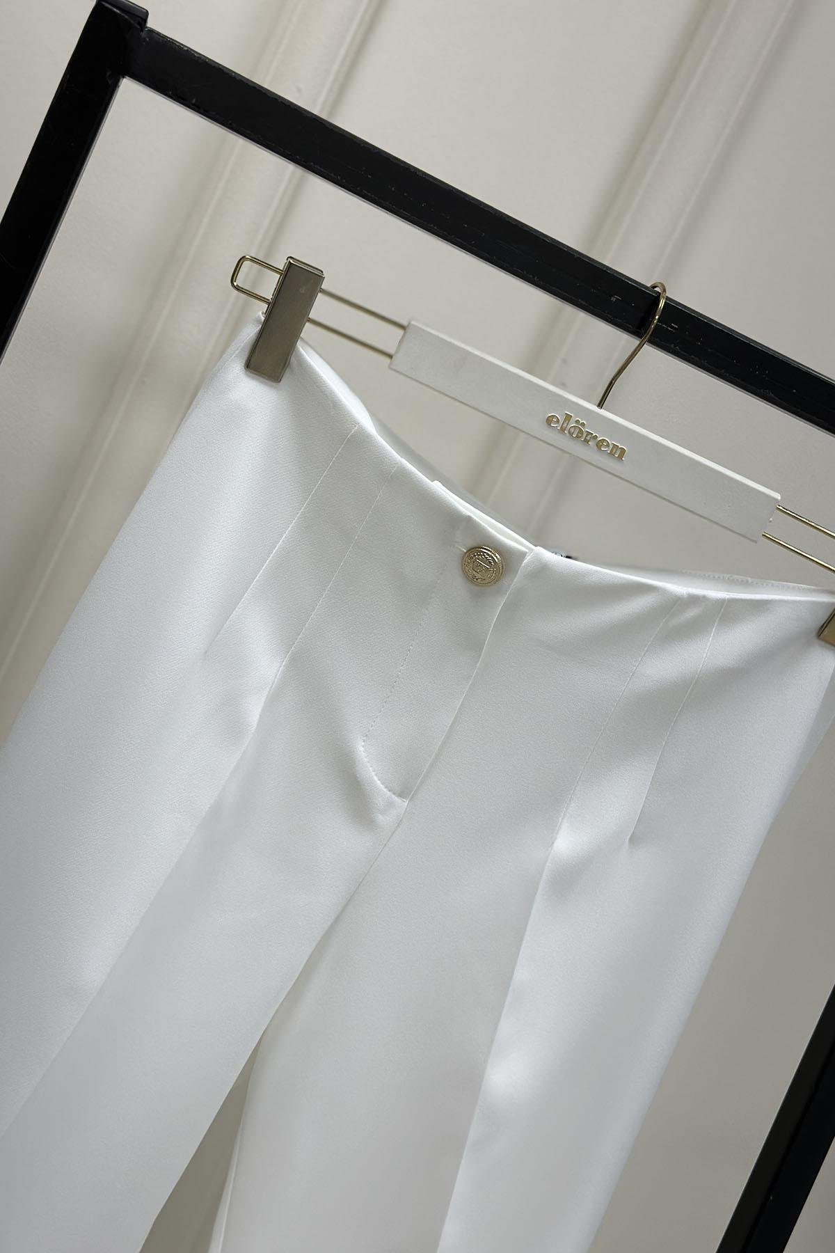 Tesettür PantolonOzan Aydın Paça Düğme Detaylı Kadın Dar Paça Pantolon Beyaz OZN 5023