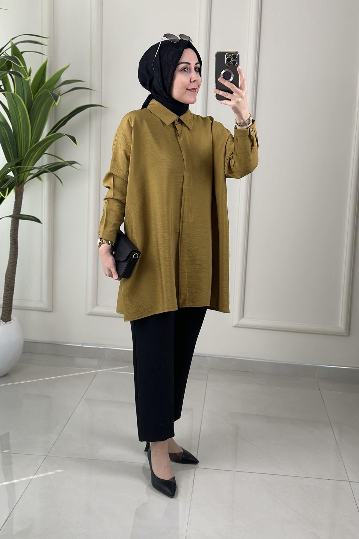 Tesettür Tunik GömlekDüşük Omuz Önü Gizli Düğmeli Oversize Kadın Tunik Yağ Yeşili KADO 251126