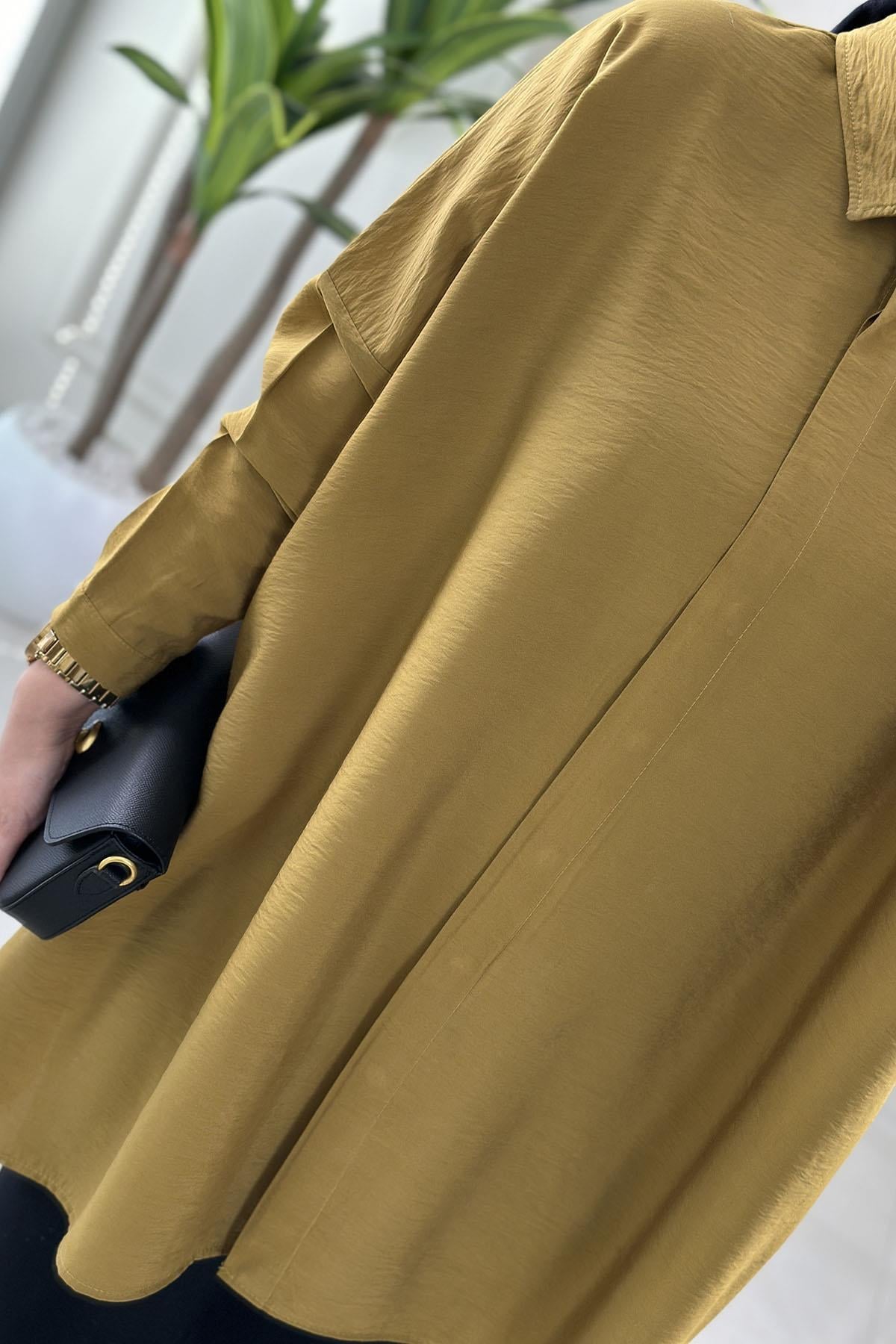 Tesettür Tunik GömlekDüşük Omuz Önü Gizli Düğmeli Oversize Kadın Tunik Yağ Yeşili KADO 251126