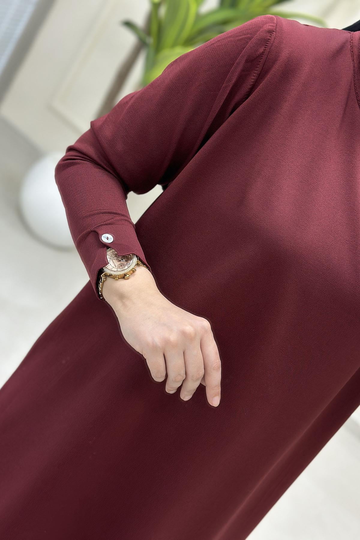 Tesettür Tunik ModelleriArka Detay ve Kol Düğme Aksesuarlı Kadın Triko Tunik Bordo KADO 2725116