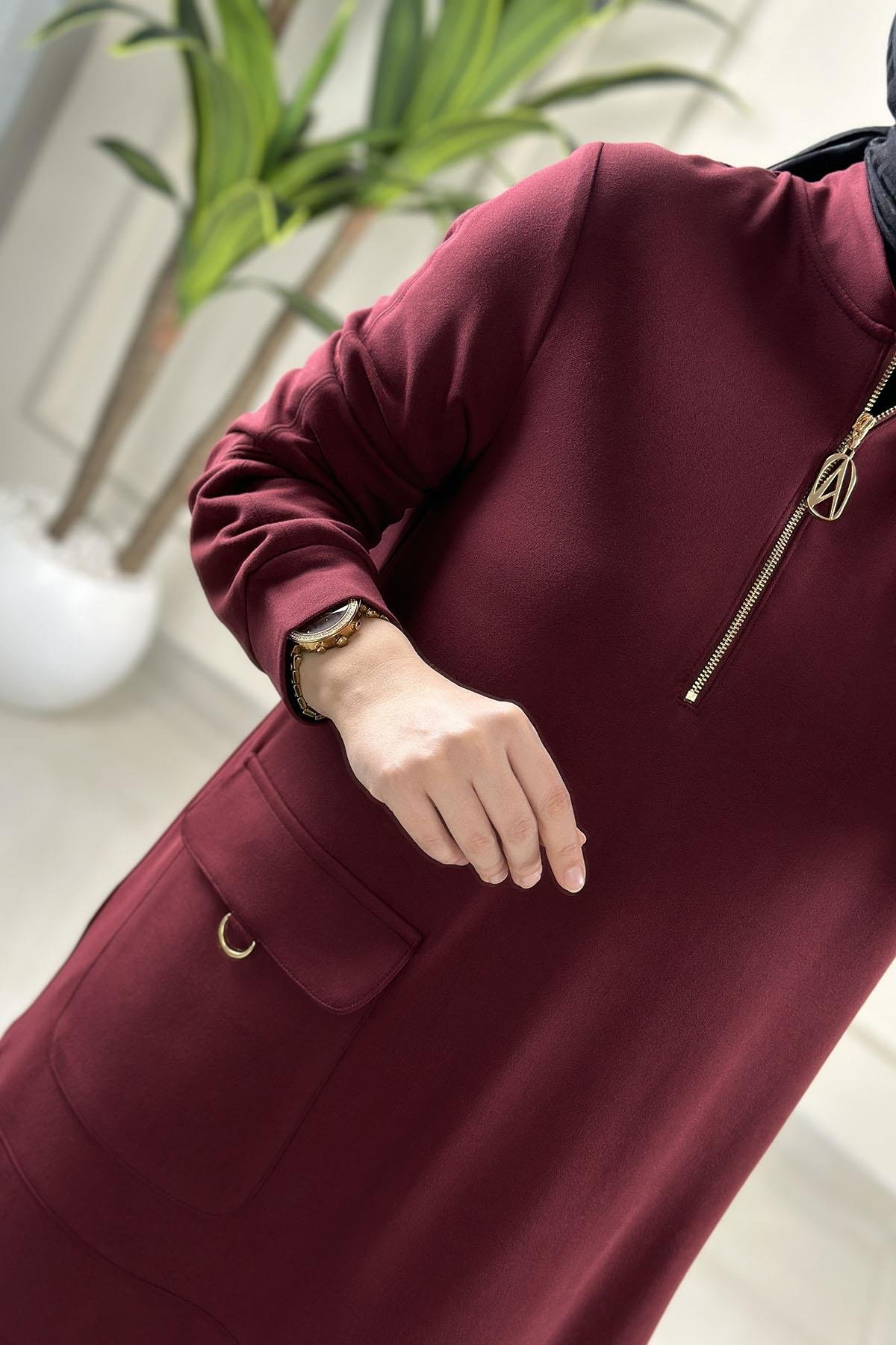 Tesettür Tunik ModelleriArmine Trend Önü Yarım Fermuarlı Cep Detaylı Kadın Modal Tunik Bordo ARM 463