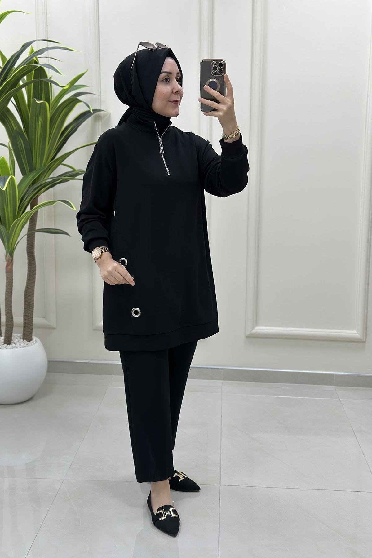 Tesettür Tunik ModelleriBelli Önü Yarım Fermuarlı Kuşgözü Detaylı Kadın Tunik Siyah BELLİ 4005