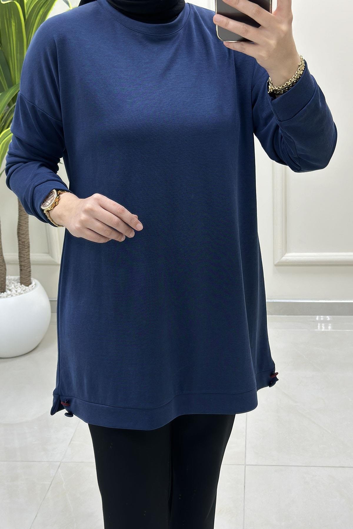 Tesettür Tunik ModelleriDüşük Omuz Etek Ucu Düğme Detaylı Modal Pike Kadın Tunik Lacivert KADO 257498