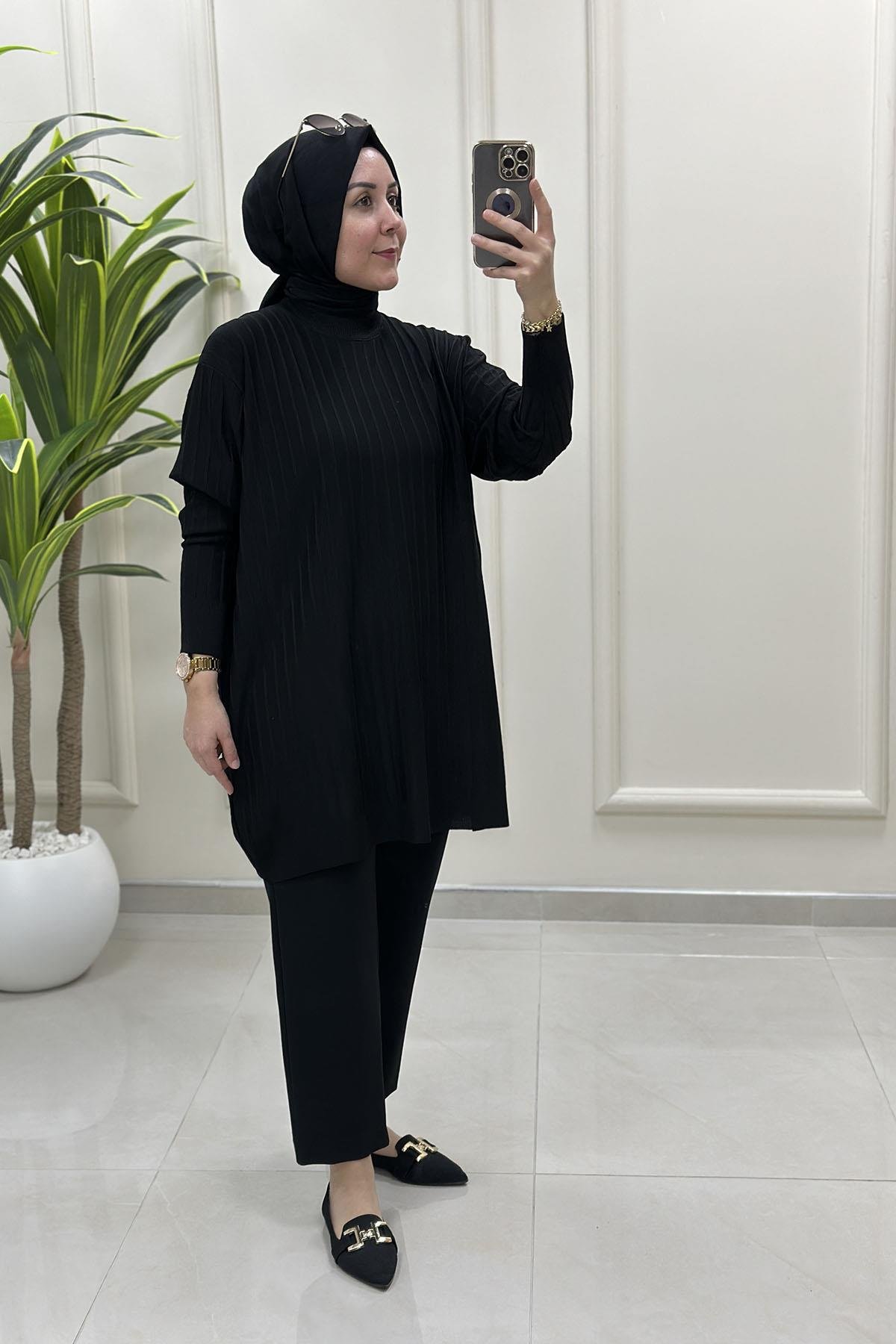 Tesettür Tunik ModelleriDüşük Omuz Fitilli Kadın Triko Tunik Siyah KADO 2725522