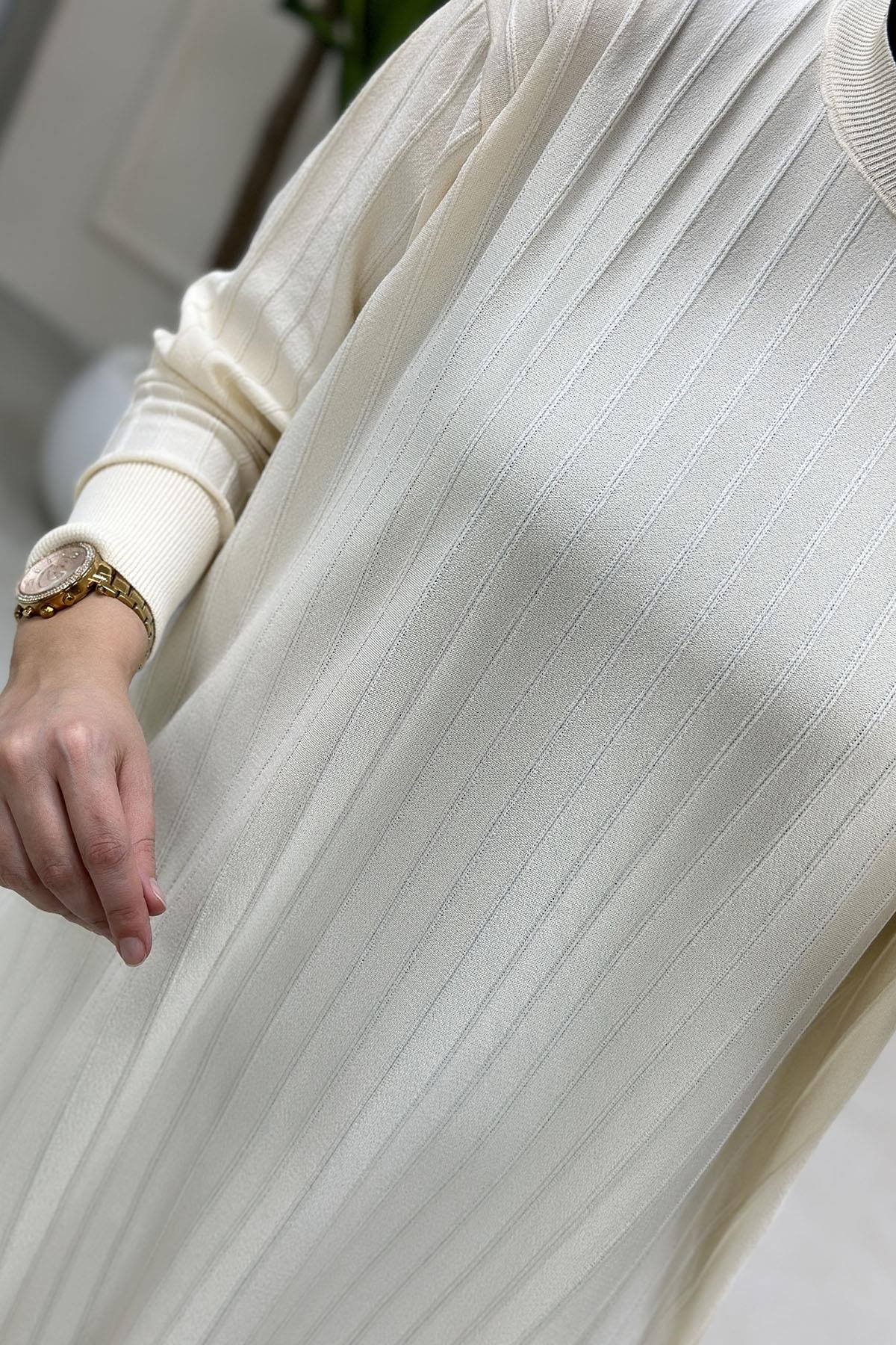 Tesettür Tunik ModelleriDüşük Omuz Fitilli Kadın Triko Tunik Bej KADO 2725522