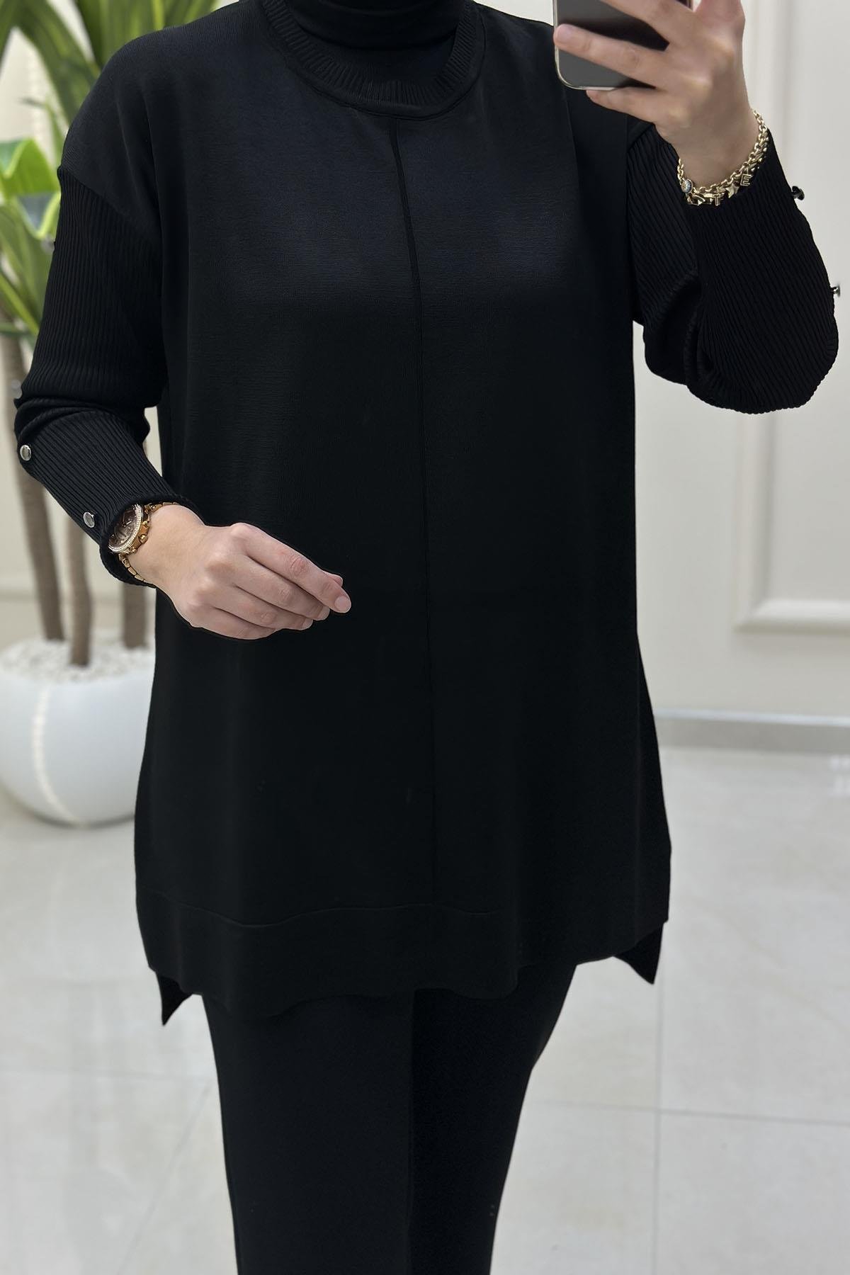 Tesettür Tunik ModelleriDüşük Omuz Kol Düğme Detaylı Kadın Merserize Tunik Siyah KADO 2725014