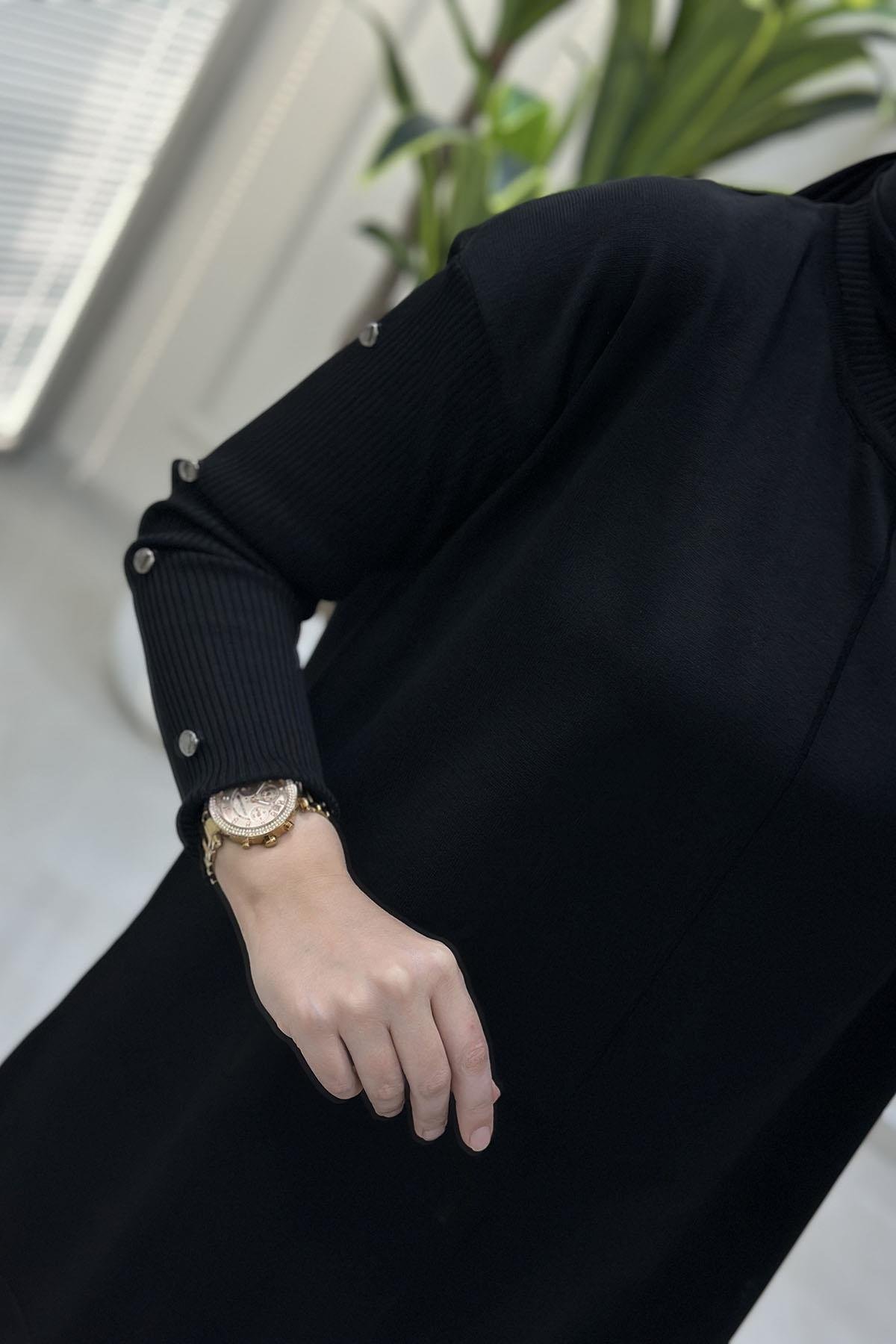 Tesettür Tunik ModelleriDüşük Omuz Kol Düğme Detaylı Kadın Merserize Tunik Siyah KADO 2725014