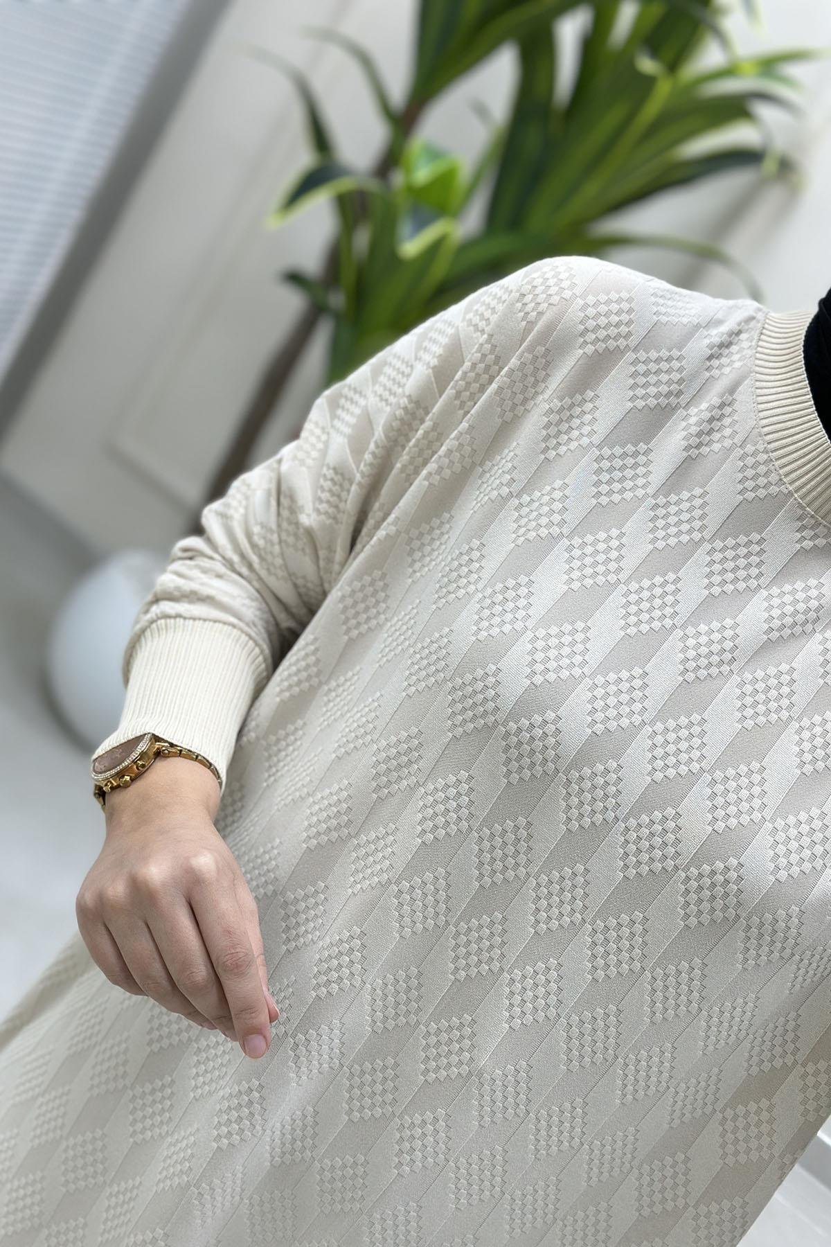 Tesettür Tunik ModelleriDüşük Omuz Ribana Detaylı Kadın Tunik Bej KADO 257344