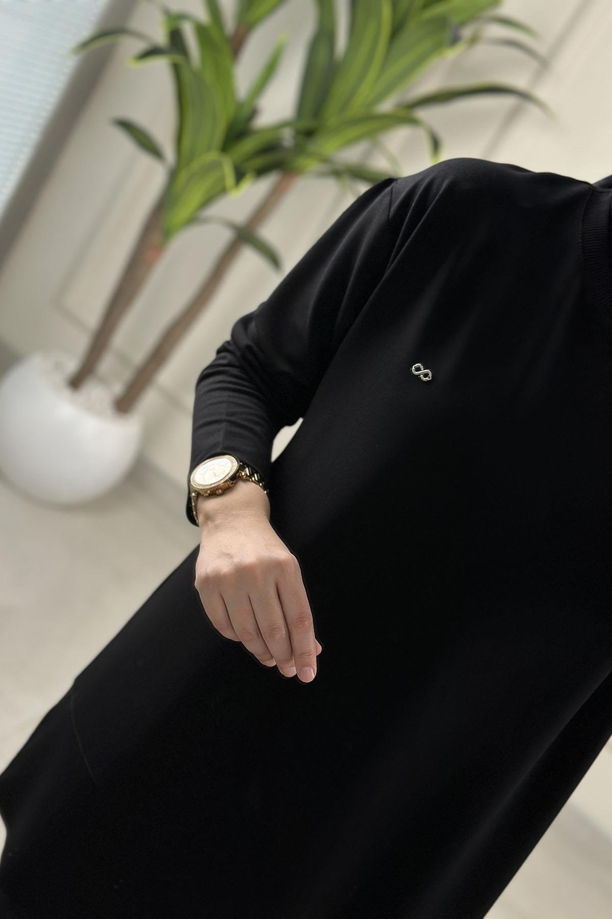 Tesettür Tunik ModelleriDüşük Omuz Yaka Ribanalı Basic Kadın Tunik Siyah KADO 257563