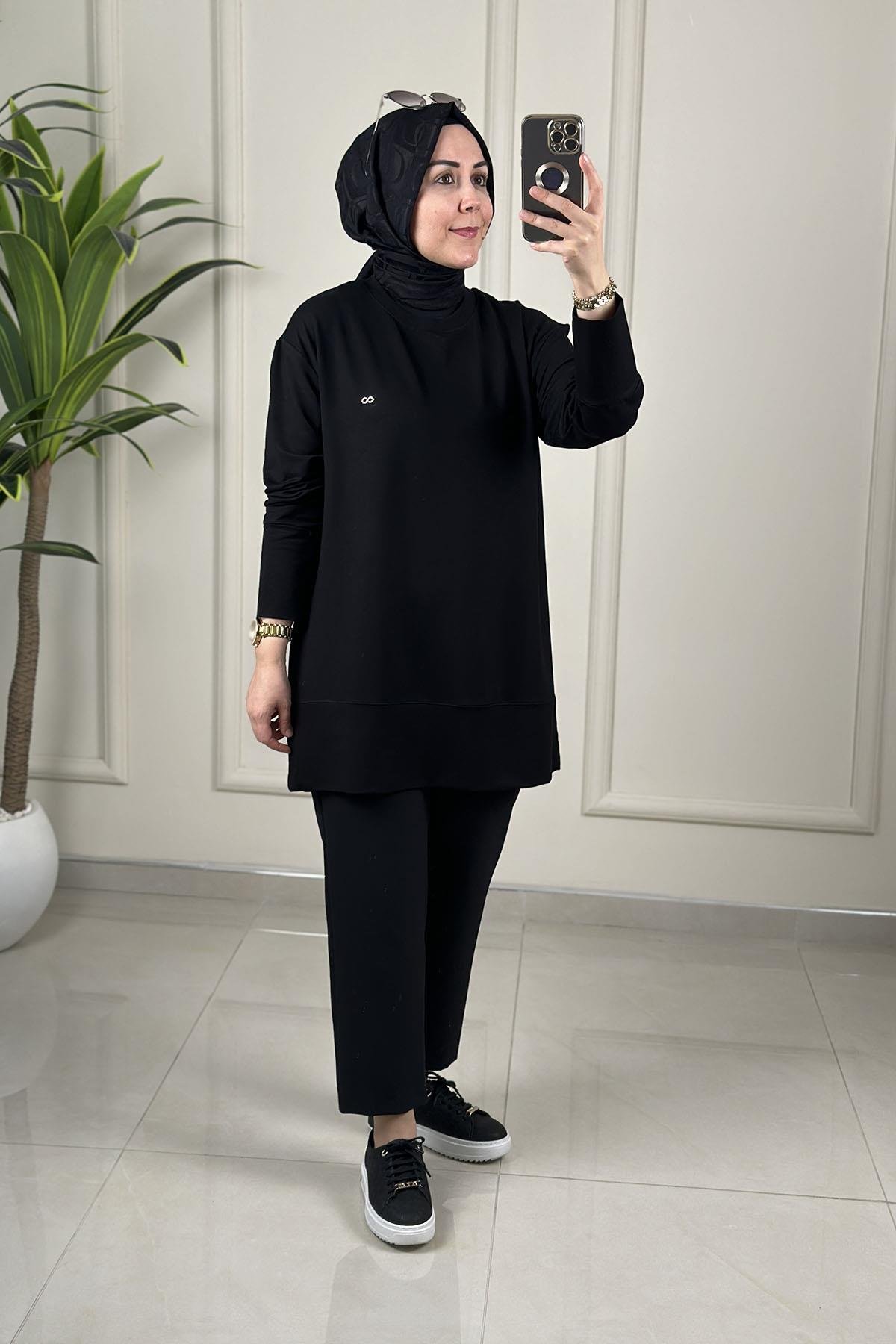 Tesettür Tunik ModelleriDüşük Omuz Yaka Ribanalı Basic Kadın Tunik Siyah KADO 257563