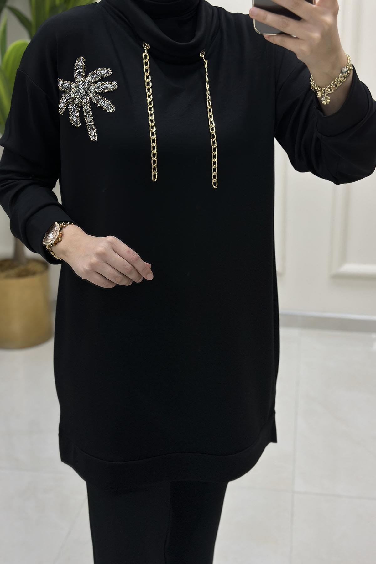 Tesettür Tunik ModelleriDüşük Omuz Zincir ve Aksesuar Detaylı Kadın Tunik Siyah GNR 215