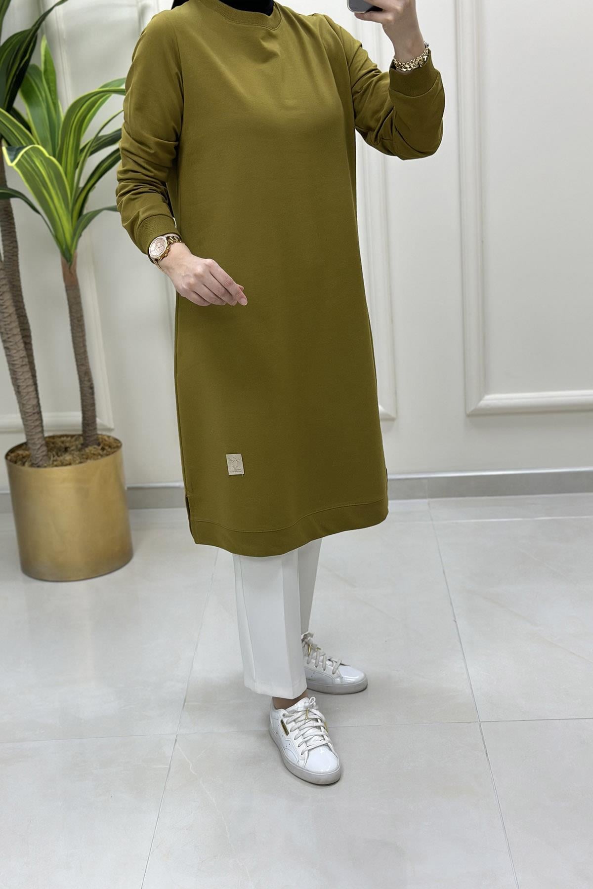 Tesettür Tunik Modelleriİki İplik Kol Ve Etek Ucu Ribanalı Spor Kadın Tunik Yağ Yeşili KADO 7194