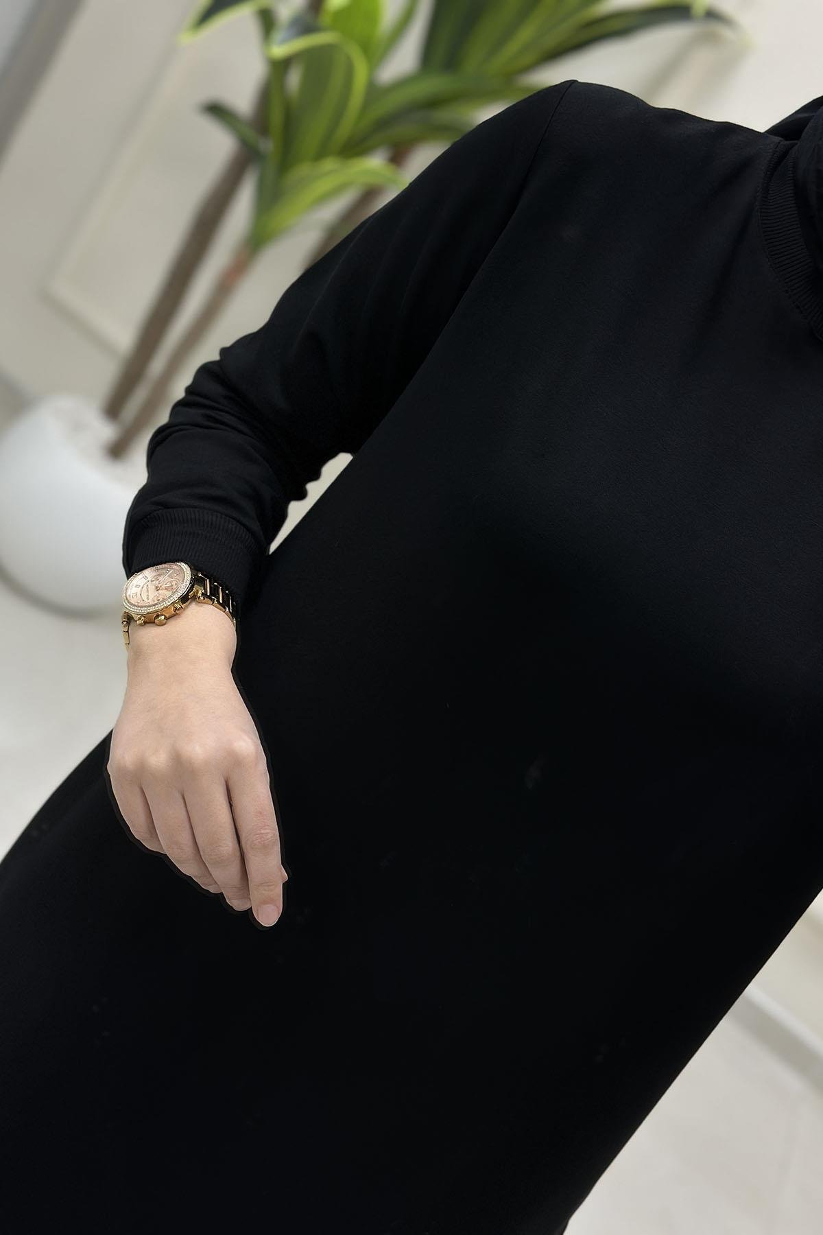 Tesettür Tunik Modelleriİnce Oysho Kol Ve Etek Ucu Ribanalı Spor Kadın Tunik Siyah KADO 7194
