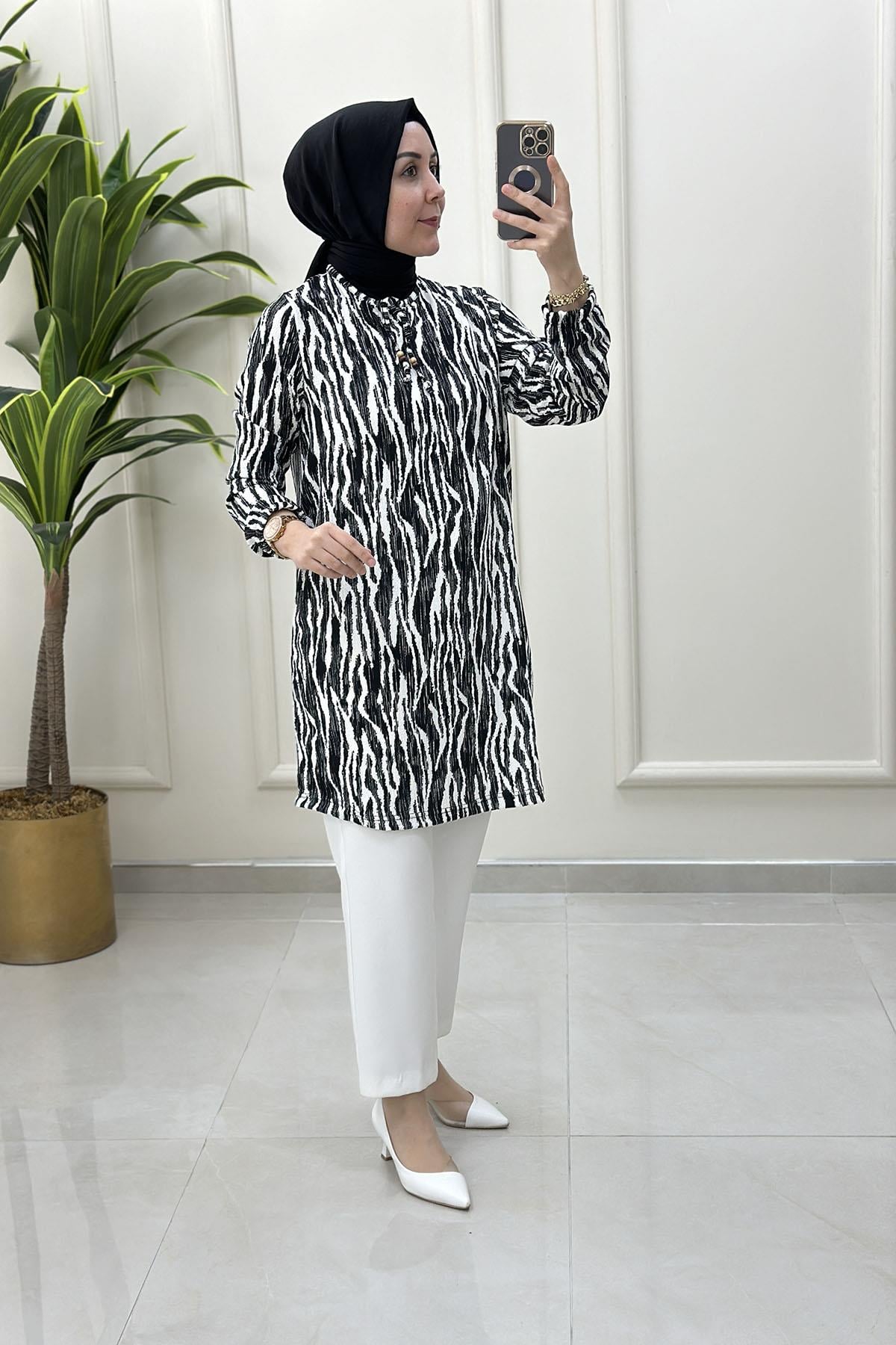 Tesettür Tunik ModelleriKendinden Desenli Kolu Büzgülü Kadın Tunik Siyah(Zebra) KADO 251714