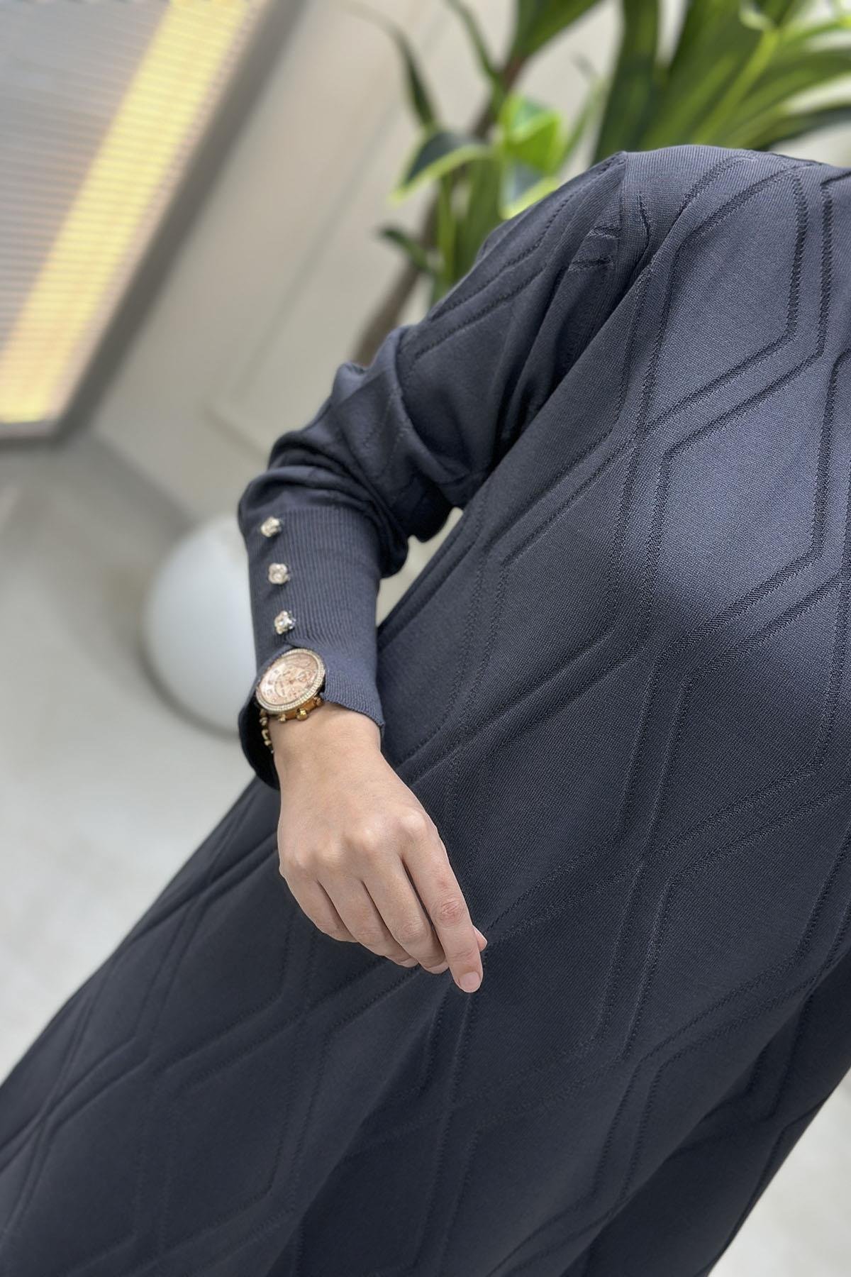 Tesettür Tunik ModelleriKendinden Desenli Kolu Düğme Detaylı Kadın Triko Tunik Gri KADO 2725303