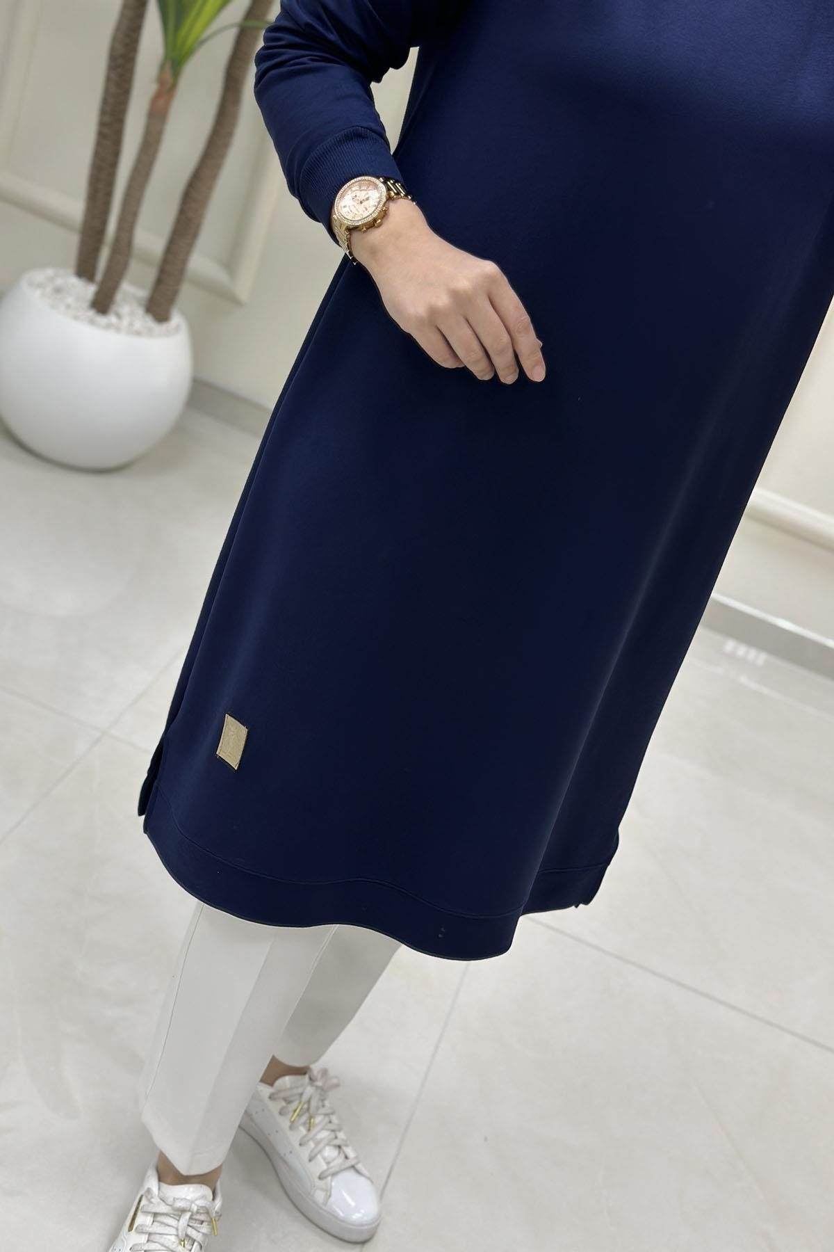 Tesettür Tunik ModelleriKol Ve Etek Ucu Ribanalı Spor Kadın Tunik Lacivert KADO 7194