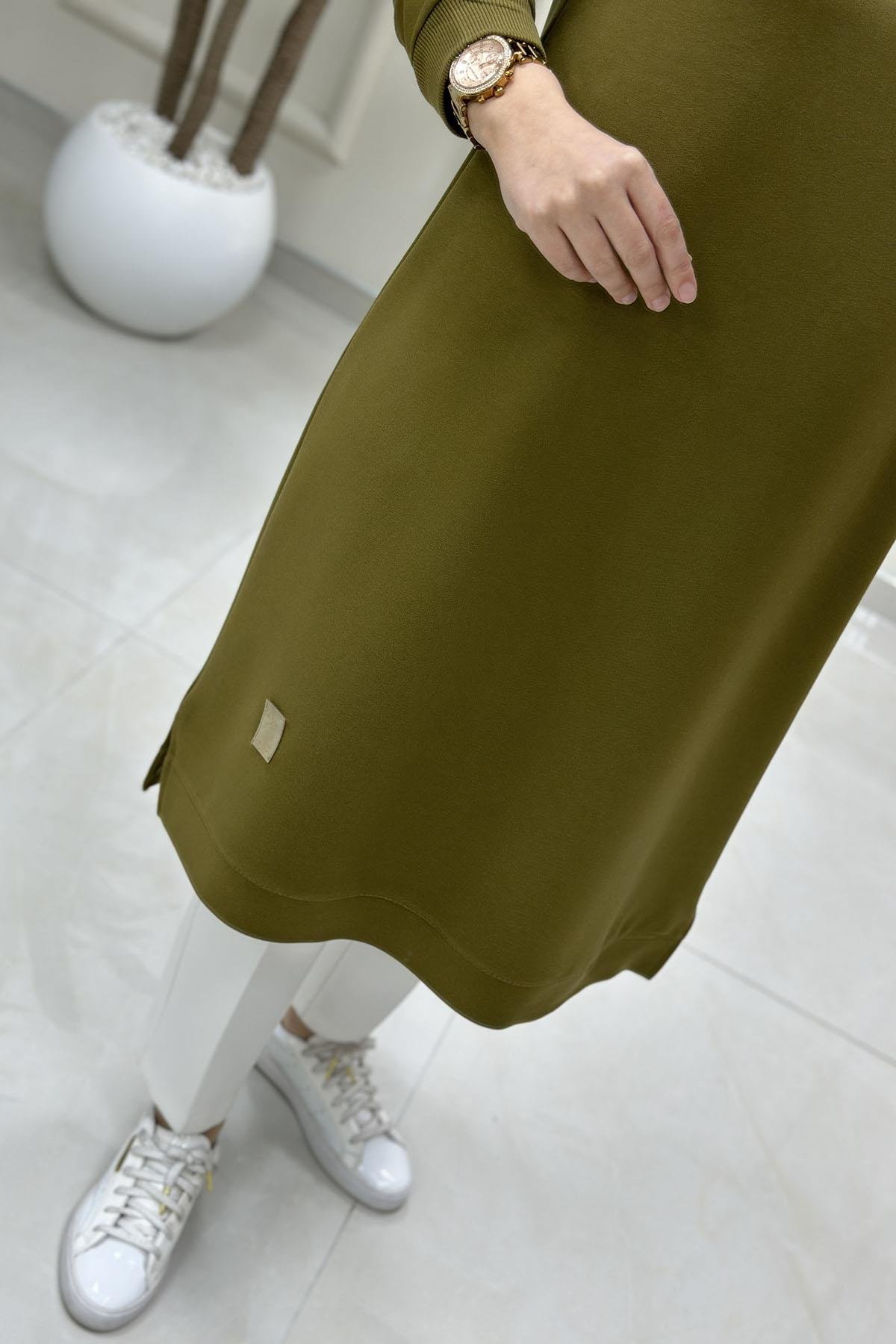 Tesettür Tunik ModelleriKol Ve Etek Ucu Ribanalı Spor Kadın Tunik Yağ Yeşili KADO 7194