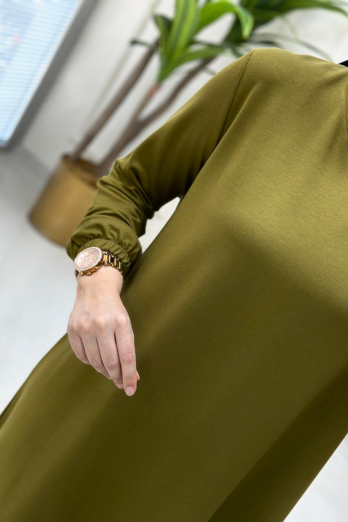 Tesettür Tunik ModelleriKolu Büzgü Detaylı Beyzik Kadın Tunik Yağ Yeşili KADO 257660