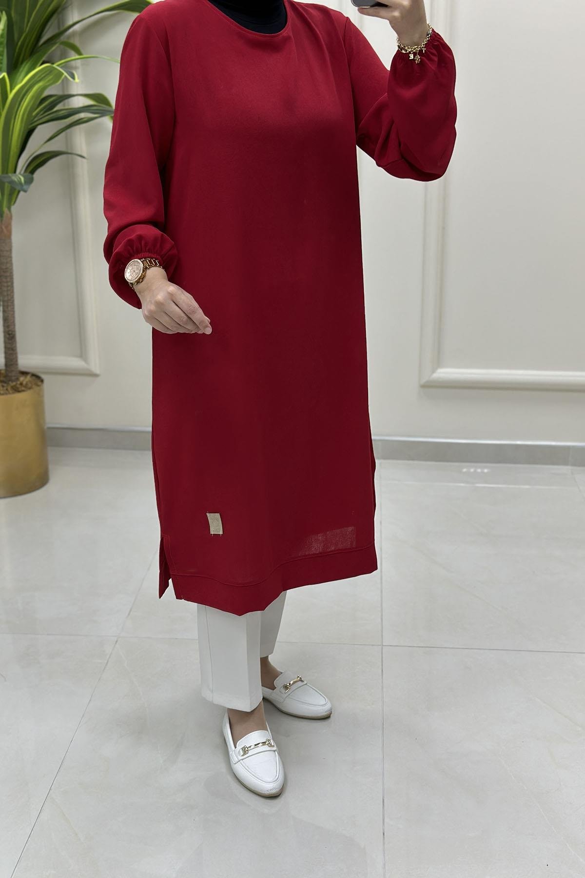 Tesettür Tunik ModelleriKolu Büzgülü Arma Detaylı Uzun Kadın Tunik Kırmızı KADO 251765