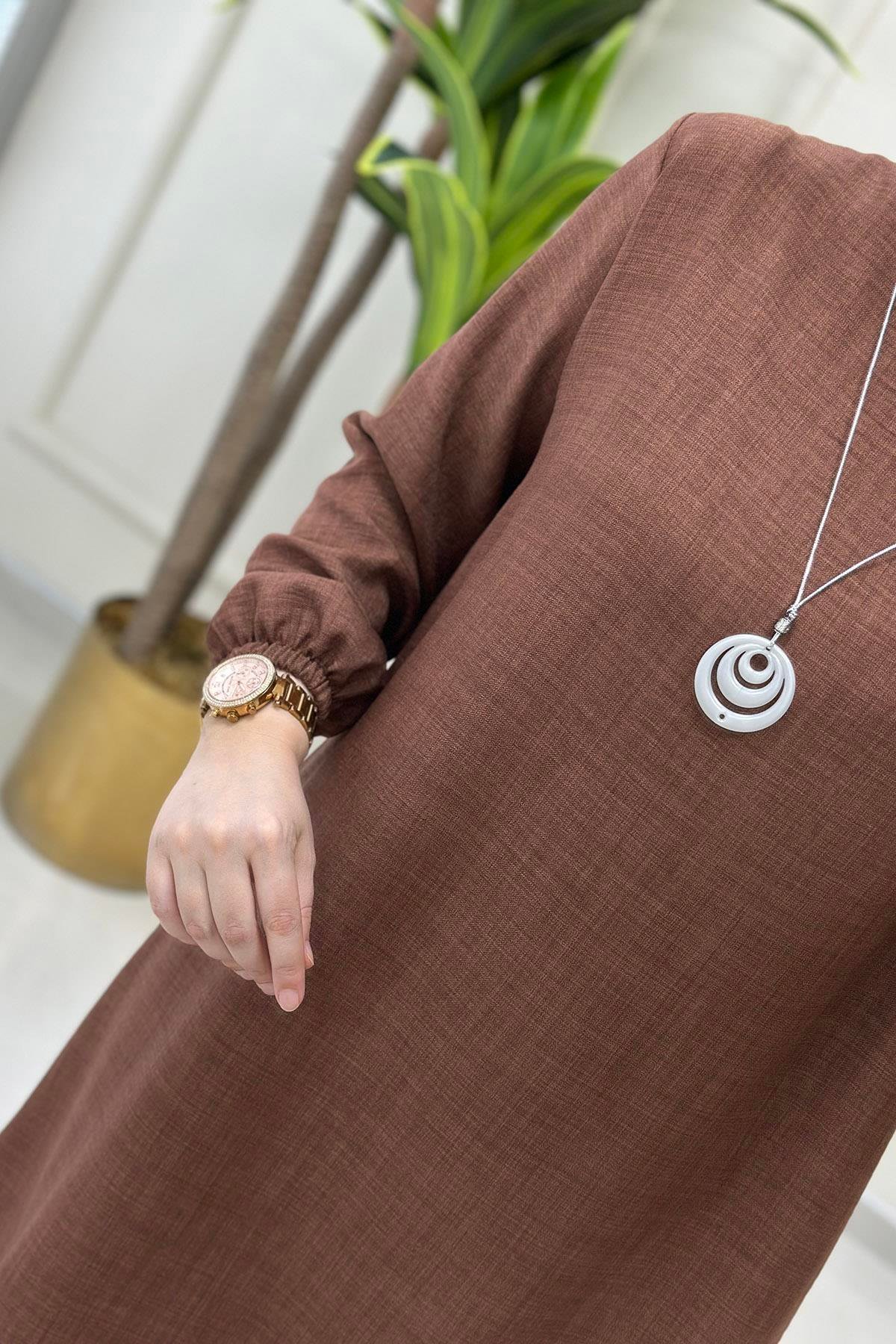 Tesettür Tunik ModelleriKolu Büzgülü Kolyeli Kadın Tunik Taba KADO 4525