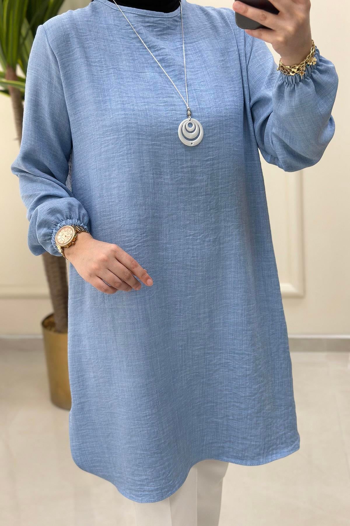 Tesettür Tunik ModelleriKolu Büzgülü Kolyeli Kadın Tunik Bebe Mavisi KADO 4525