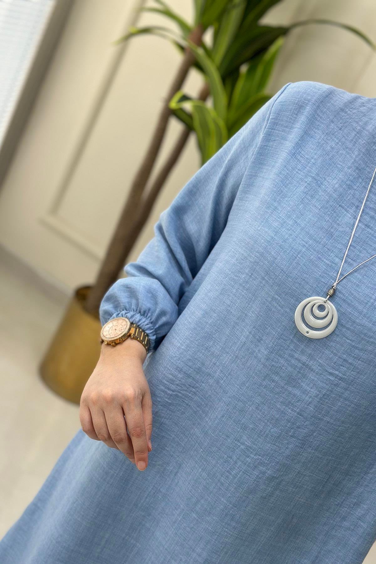 Tesettür Tunik ModelleriKolu Büzgülü Kolyeli Kadın Tunik Bebe Mavisi KADO 4525