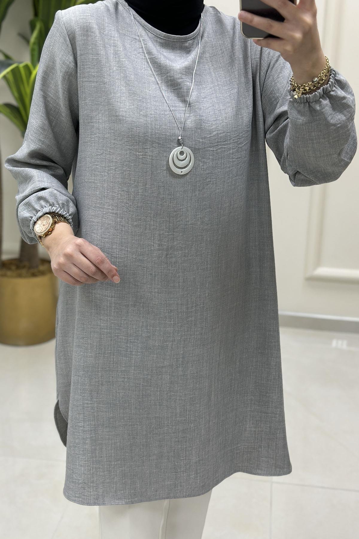 Tesettür Tunik ModelleriKolu Büzgülü Kolyeli Kadın Tunik Gri KADO 4525