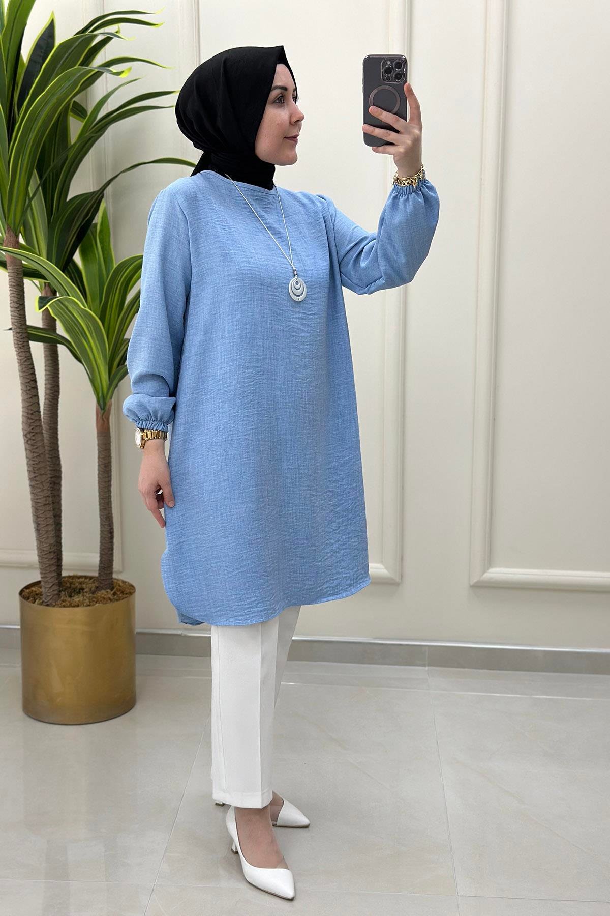 Tesettür Tunik ModelleriKolu Büzgülü Kolyeli Kadın Tunik Bebe Mavisi KADO 4525