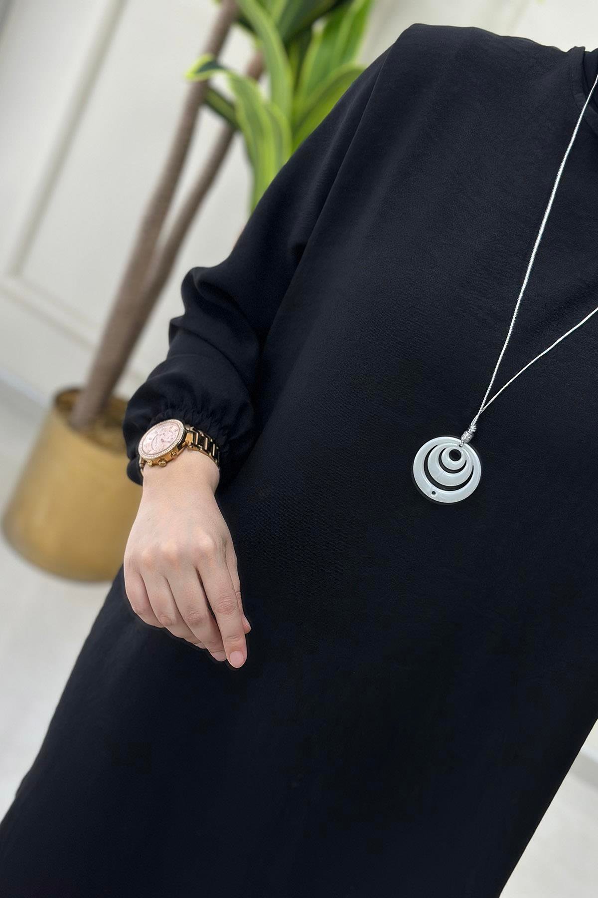 Tesettür Tunik ModelleriKolu Büzgülü Kolyeli Kadın Tunik Siyah KADO 4525