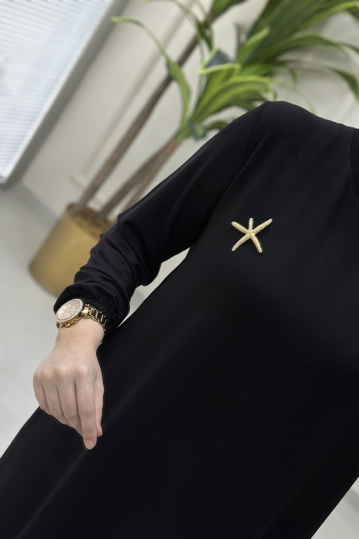 Tesettür Tunik ModelleriKolu Lastikli Broş Detaylı Kadın Tunik Siyah KADO 251784