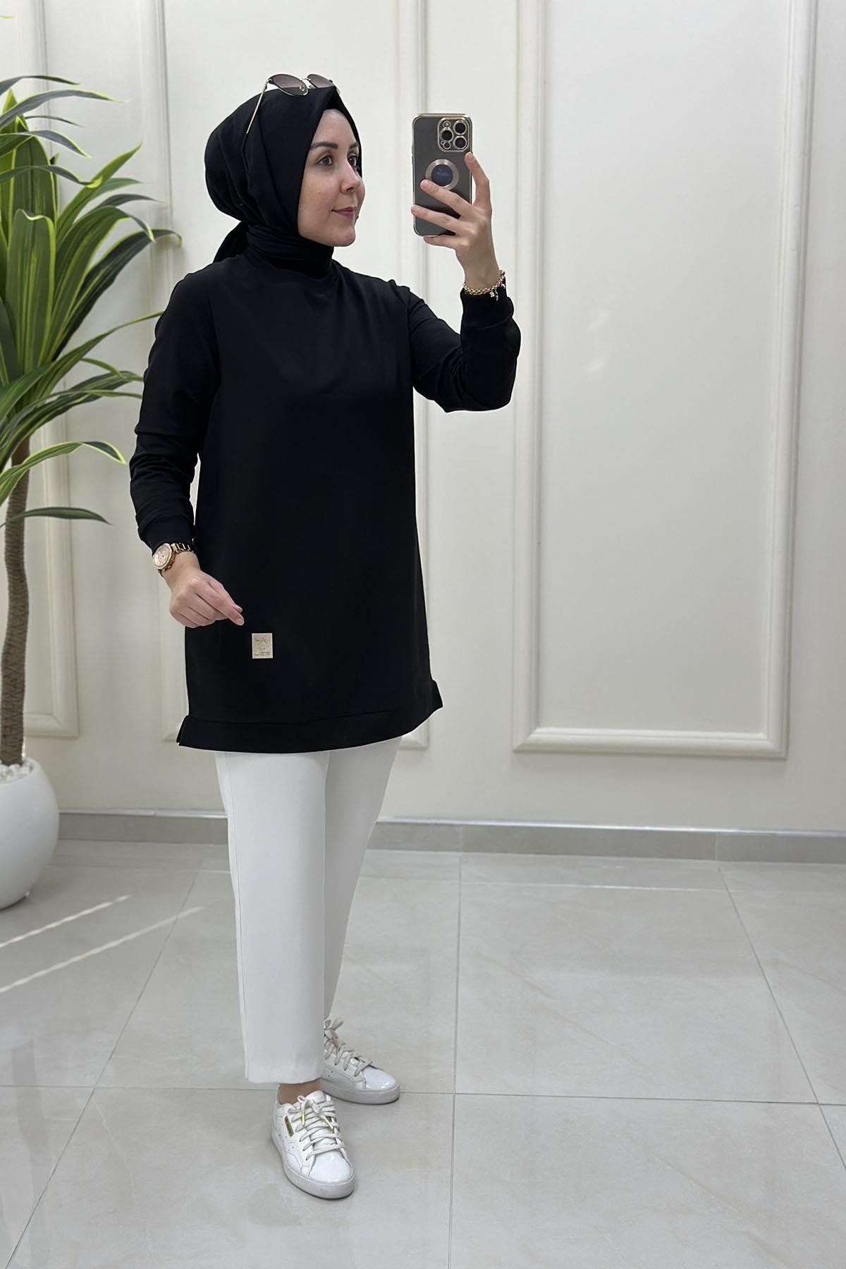 Tesettür Tunik ModelleriKolu Ribanalı Armalı Spor Kadın Tunik Siyah KADO 7191