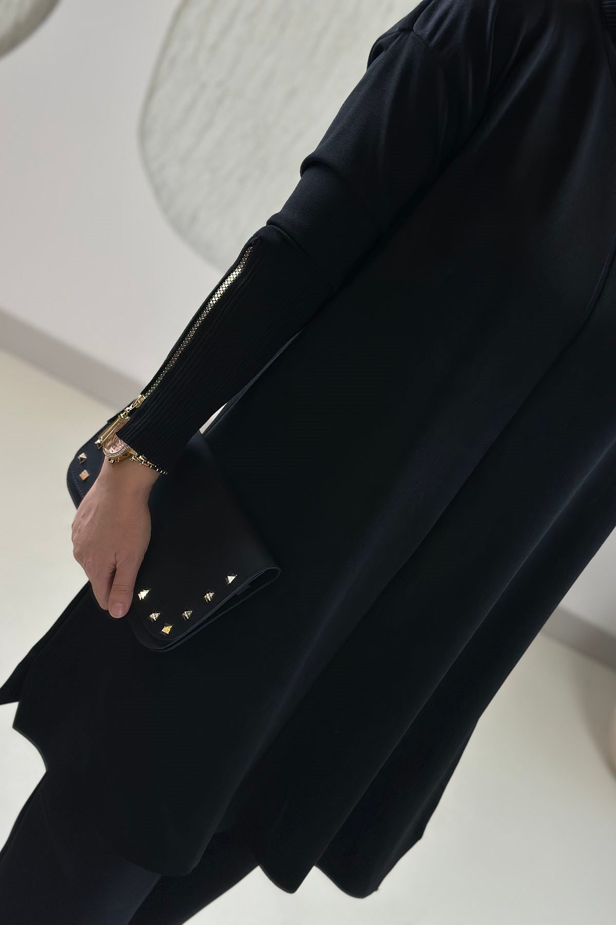 Tesettür Tunik ModelleriMerserize Triko Kol Fermuar Detaylı Kadın Tunik Siyah KADO 27260027