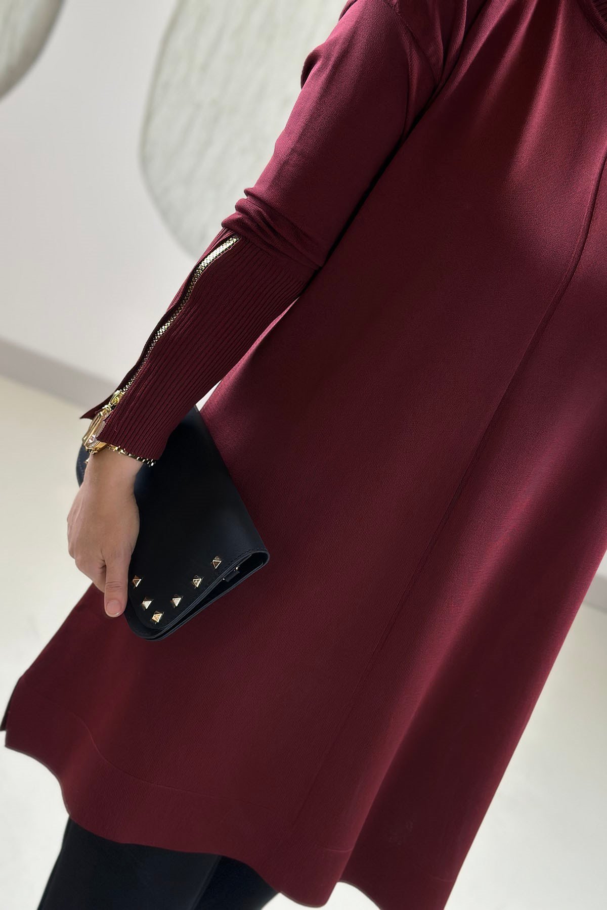 Tesettür Tunik ModelleriMerserize Triko Kol Fermuar Detaylı Kadın Tunik Bordo KADO 27260027