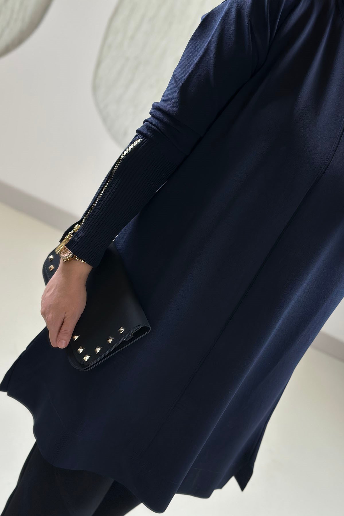 Tesettür Tunik ModelleriMerserize Triko Kol Fermuar Detaylı Kadın Tunik Lacivert KADO 27260027